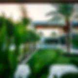 Serene view of Al Jurf Gardens showcasing lush greenery and modern architecture