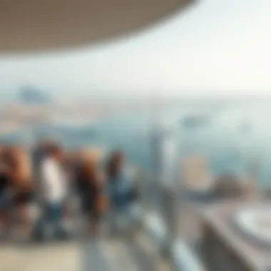 Breathtaking Views from Dubai Eye Observation Deck Tourists enjoying the view from the Dubai Eye observation deck